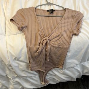 Tan bodysuit size large but runs small